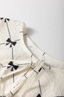 Bow Print Tie Neck Half Sleeve Dress -Ruby's Rubbish 4f55d470 bbcc 407b bba2 1e09160d75c0 Max